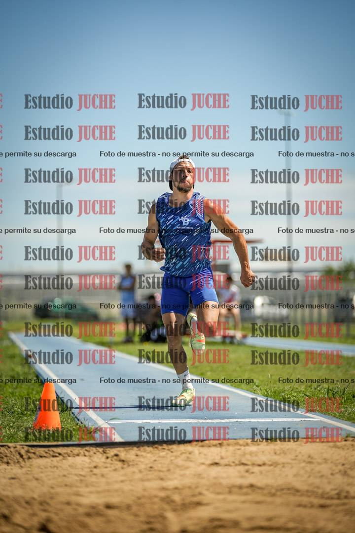 Fotos del salto en largo de varones
