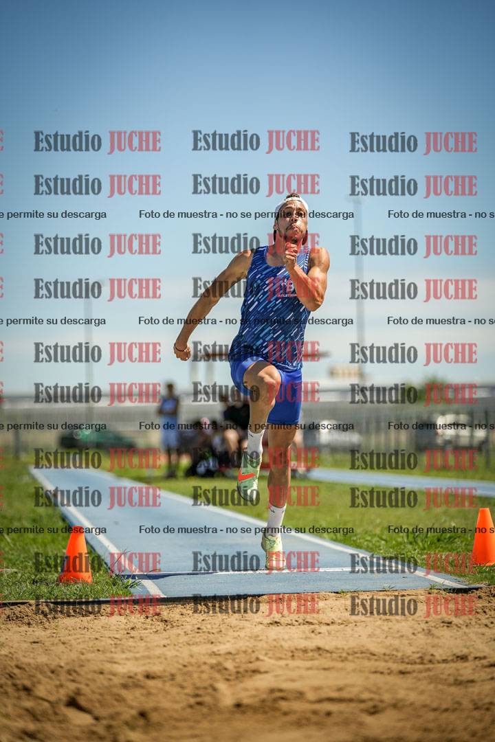 Fotos del salto en largo de varones