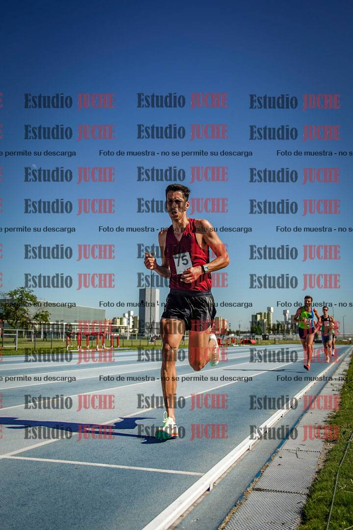 Fotos de los 5000 m de mujeres y varones - serie 1