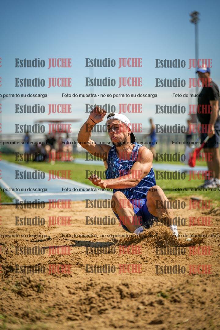 Fotos del salto en largo de varones