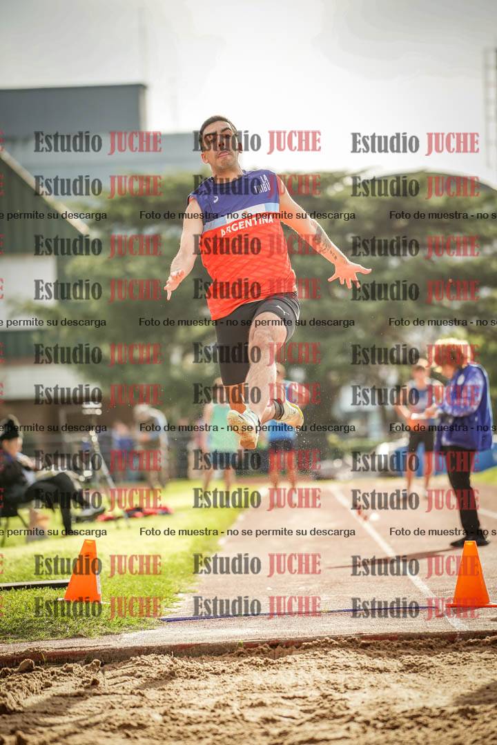 Fotos del salto en largo de varones
