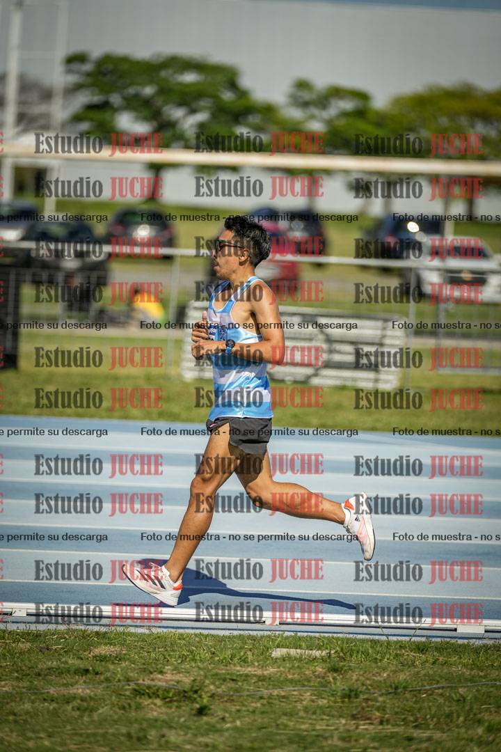 Fotos de los 5000 m de mujeres y varones - serie 1