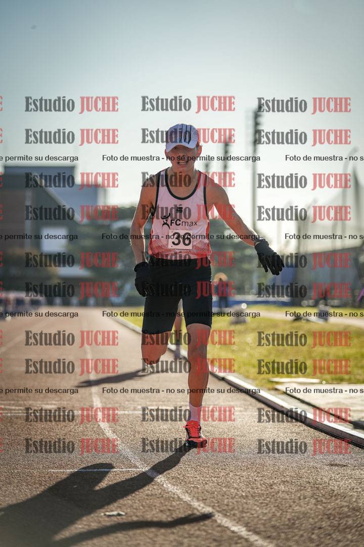 Fotos de los 10.000 m llanos de mujeres y varones