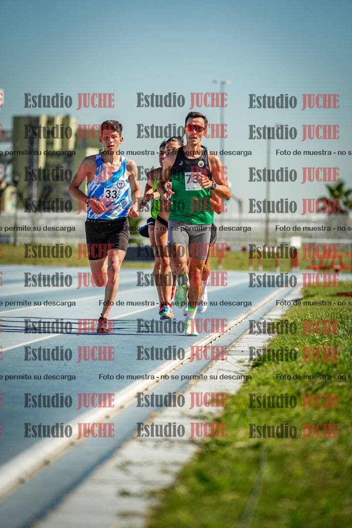 Fotos de los 5000 m de mujeres y varones - serie 1