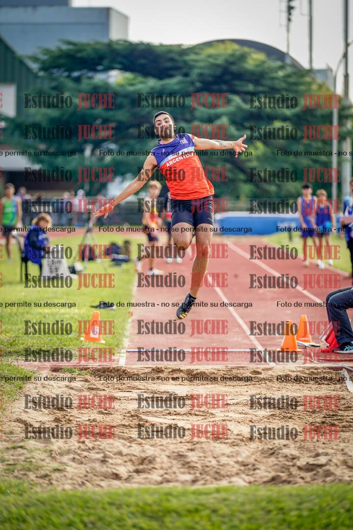 Fotos del salto en largo de varones