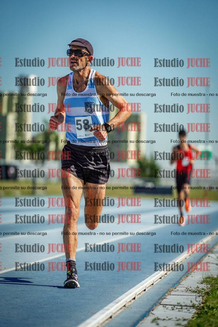 Fotos de los 5000 m de mujeres y varones - serie 1