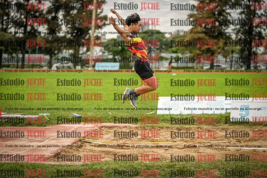 Fotos del salto en largo - varones mayores