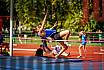 Fotos del salto en alto de mujeres y varones