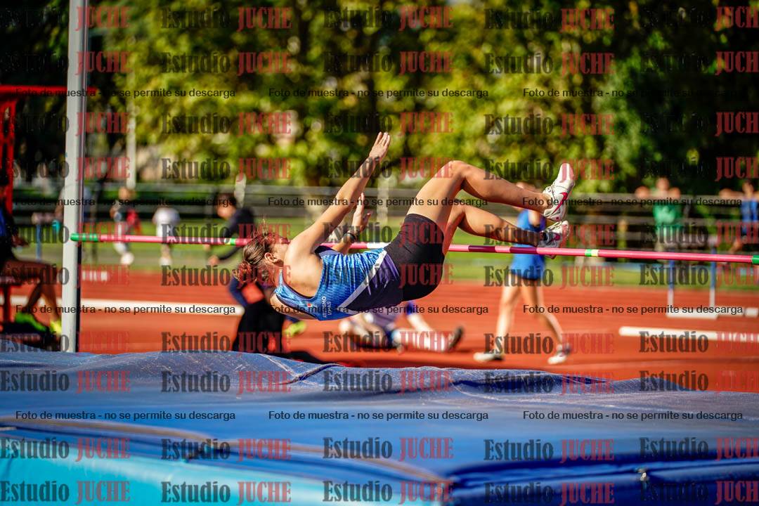 Fotos del salto en alto de mujeres y varones