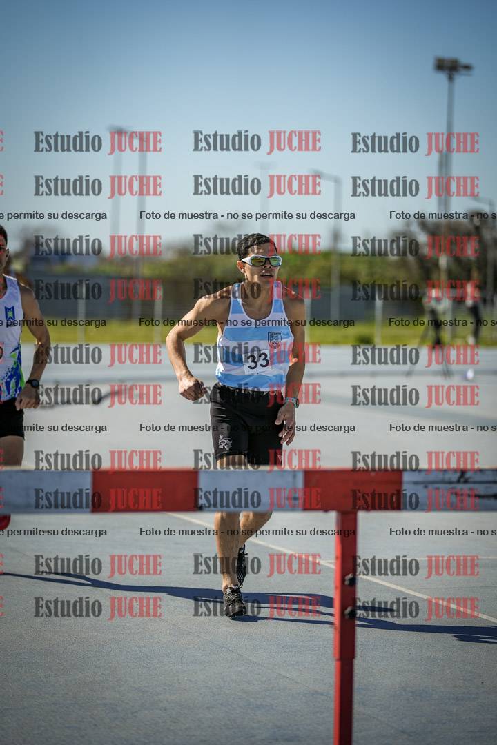 Fotos de los 3000 m con obstáculos de varones