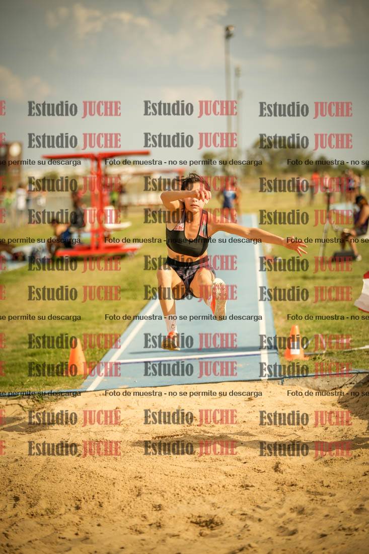 Fotos del salto en largo de mujeres