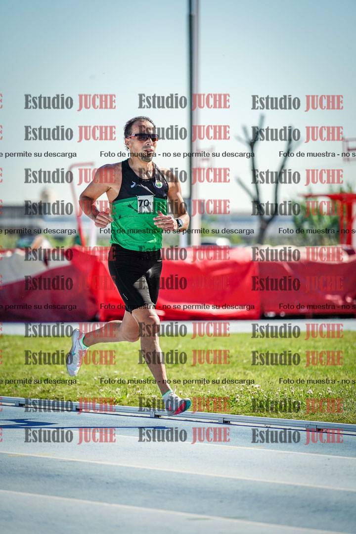 Fotos de los 5000 m de mujeres y varones - serie 1