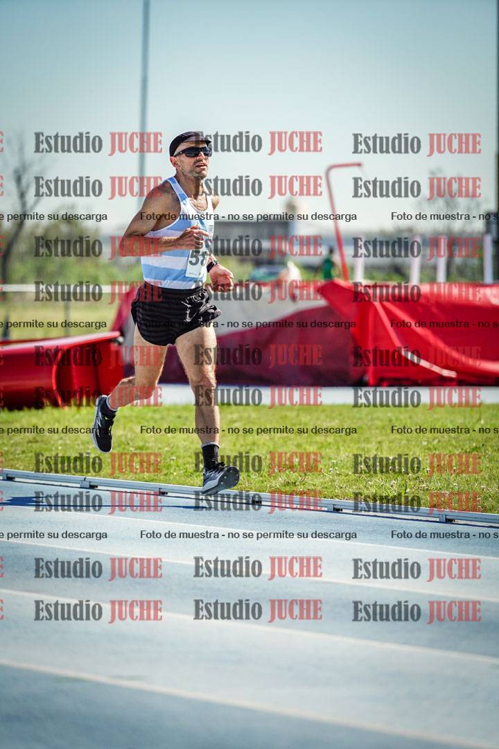 Fotos de los 5000 m de mujeres y varones - serie 1