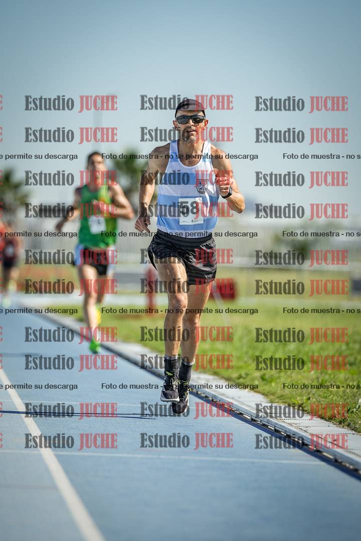 Fotos de los 5000 m de mujeres y varones - serie 1