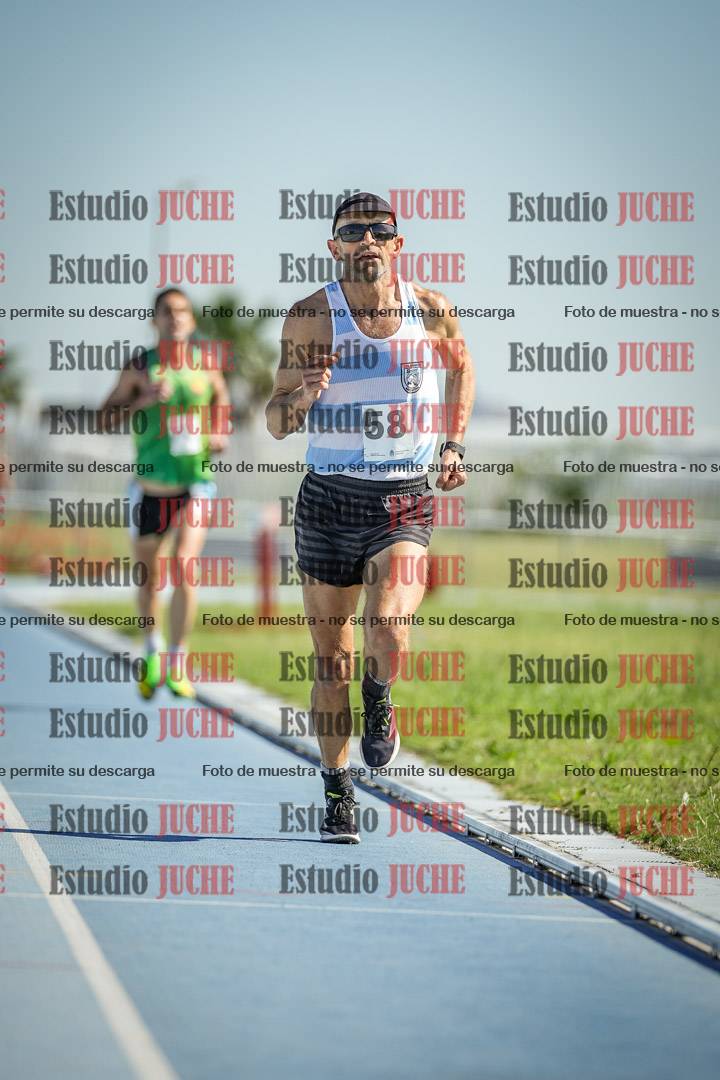 Fotos de los 5000 m de mujeres y varones - serie 1