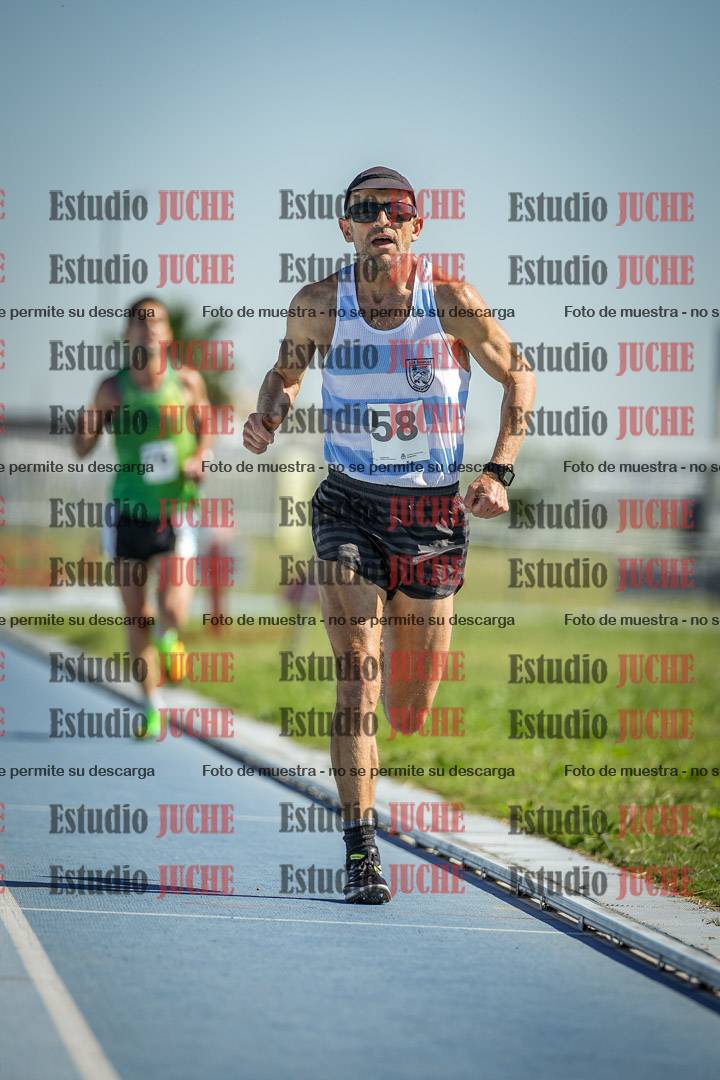 Fotos de los 5000 m de mujeres y varones - serie 1
