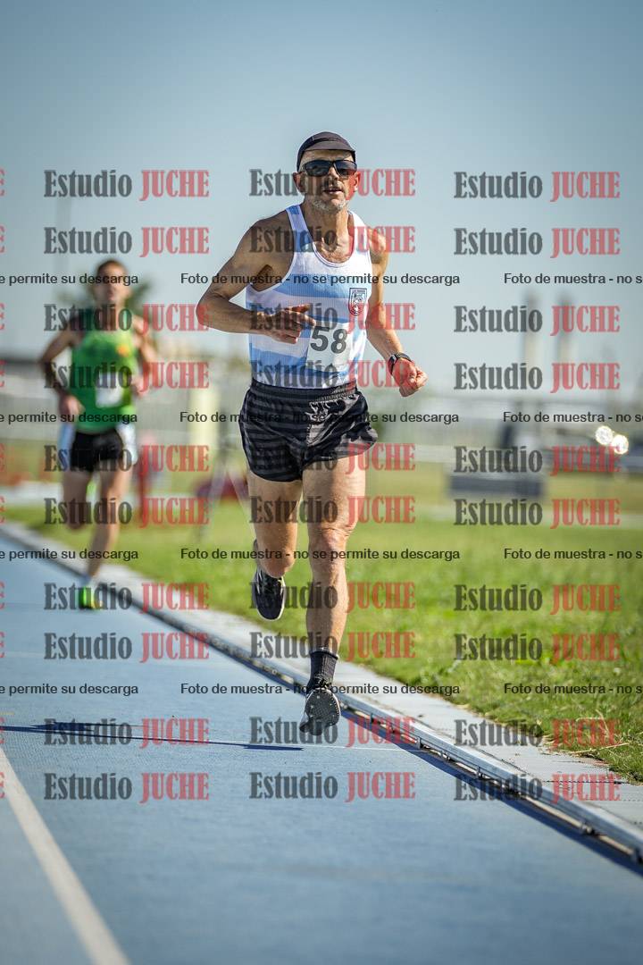 Fotos de los 5000 m de mujeres y varones - serie 1