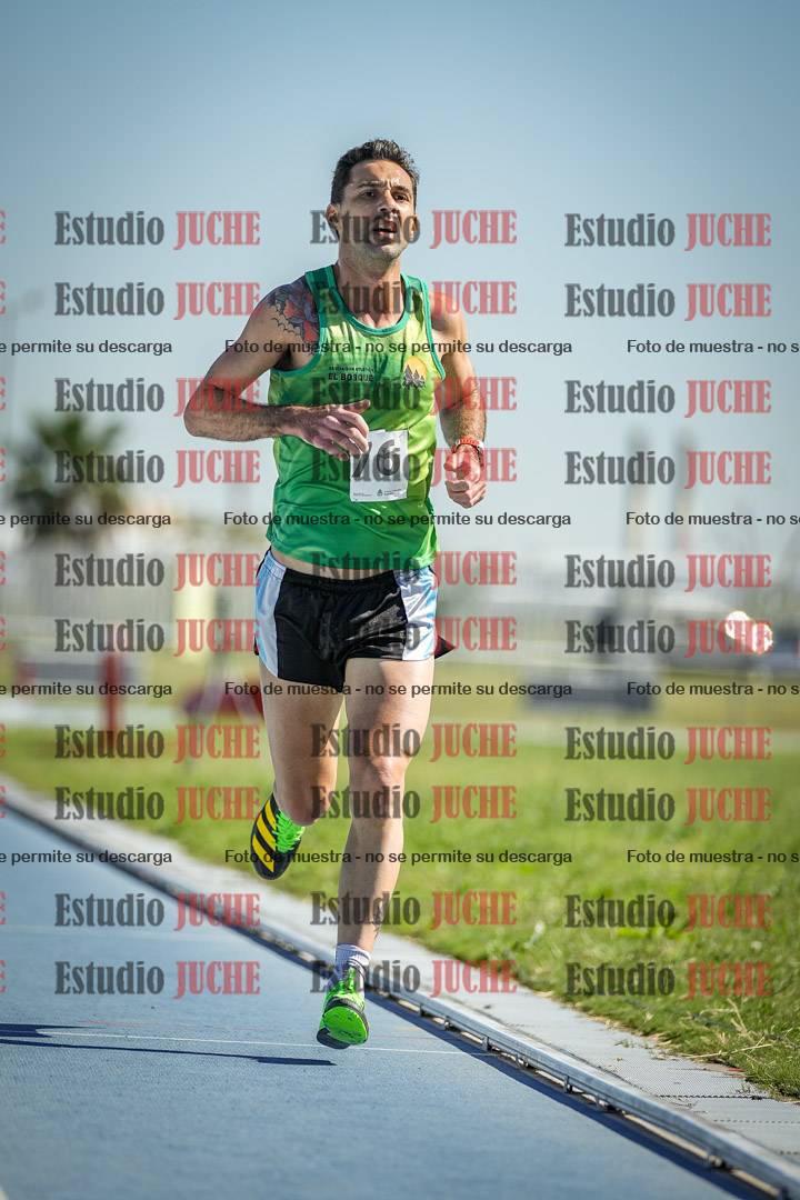 Fotos de los 5000 m de mujeres y varones - serie 1
