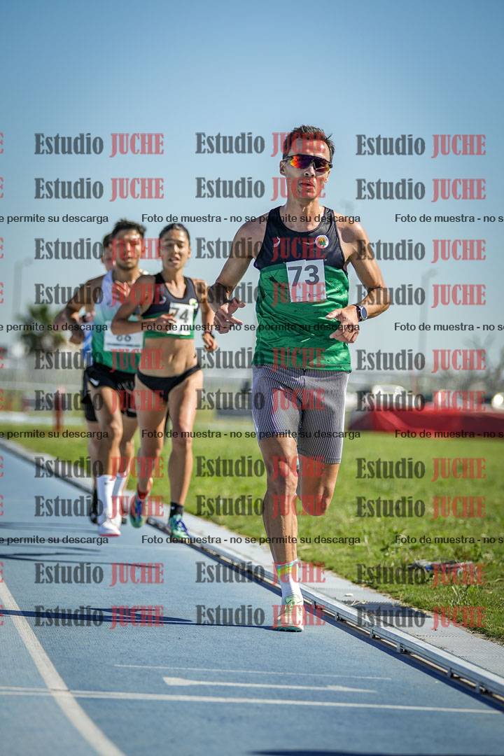 Fotos de los 5000 m de mujeres y varones - serie 1