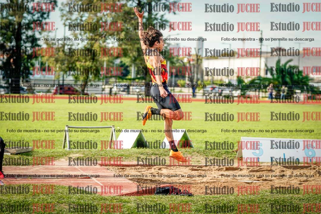 Fotos del salto en largo de varones