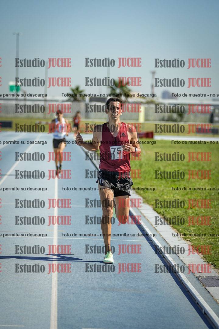Fotos de los 5000 m de mujeres y varones - serie 1