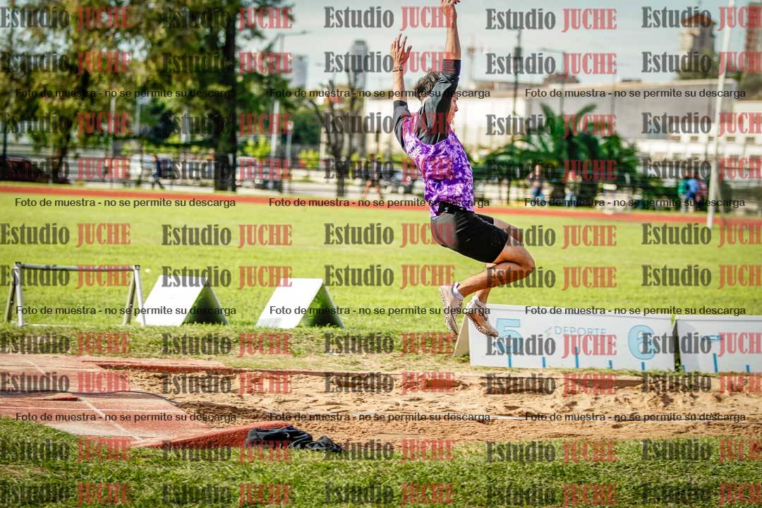 Fotos del salto en largo de varones