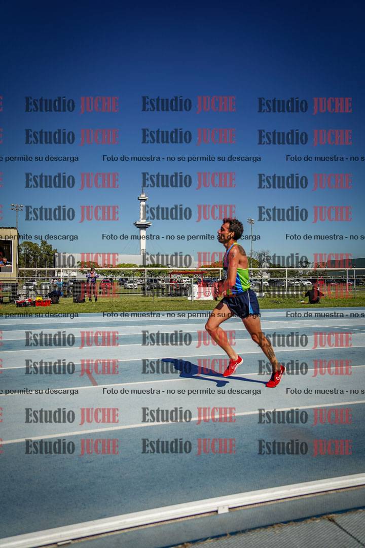 Fotos de los 5000 m de mujeres y varones - serie 1