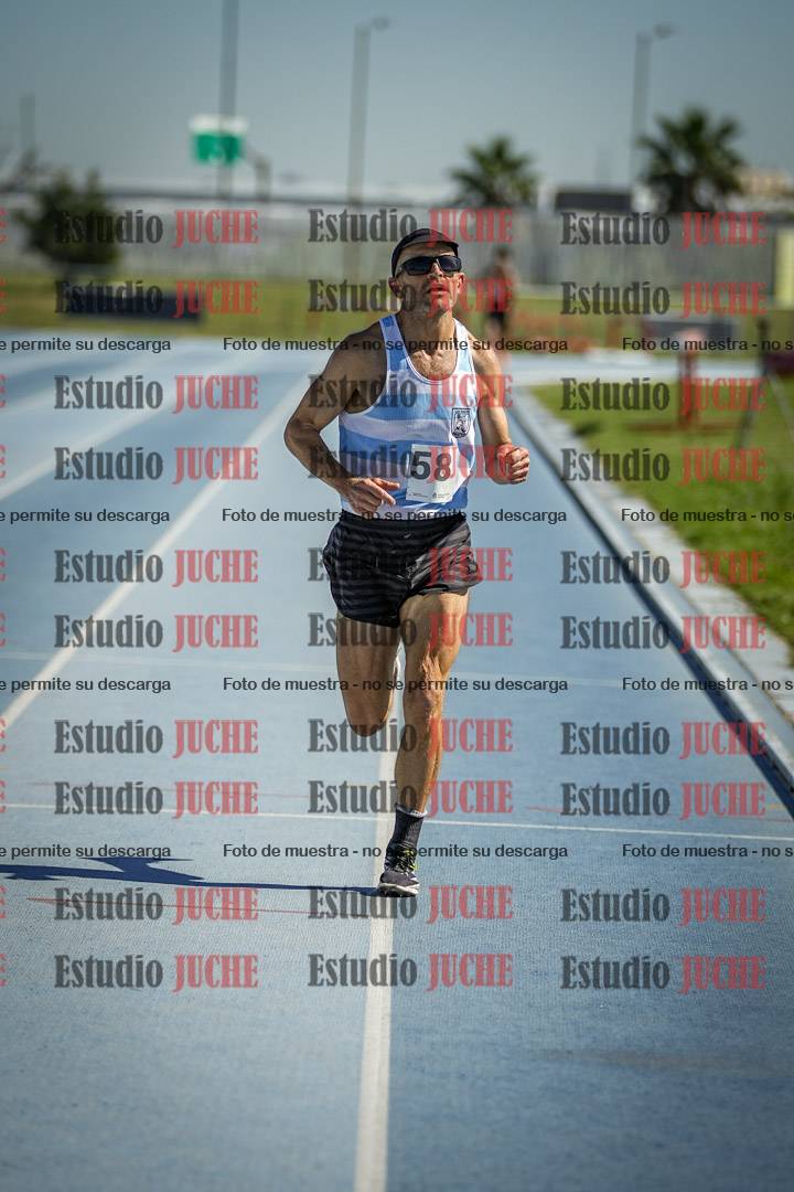 Fotos de los 5000 m de mujeres y varones - serie 1
