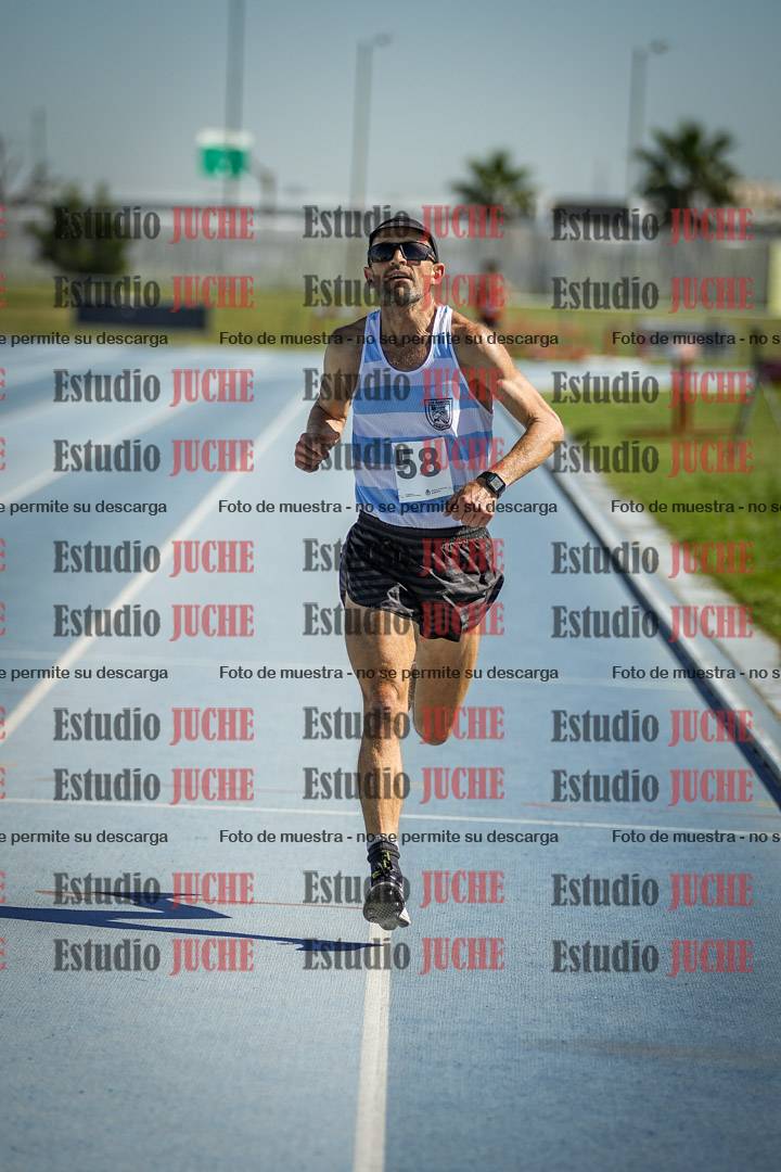 Fotos de los 5000 m de mujeres y varones - serie 1