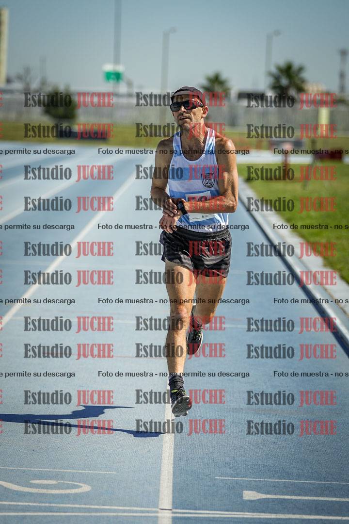 Fotos de los 5000 m de mujeres y varones - serie 1