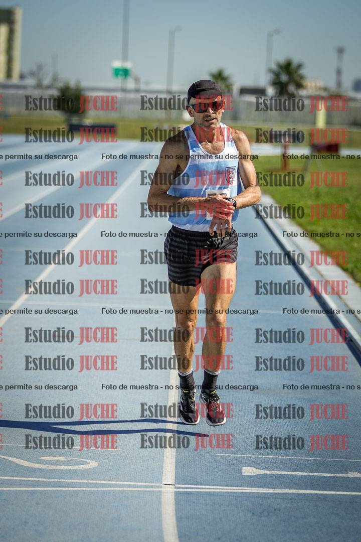 Fotos de los 5000 m de mujeres y varones - serie 1