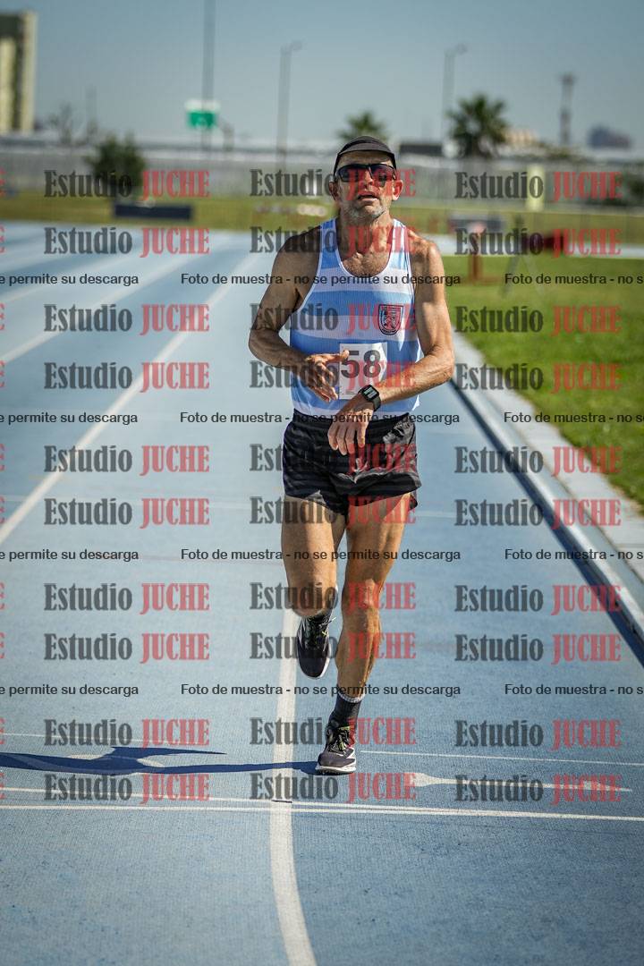 Fotos de los 5000 m de mujeres y varones - serie 1