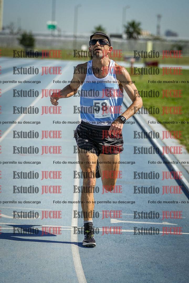 Fotos de los 5000 m de mujeres y varones - serie 1