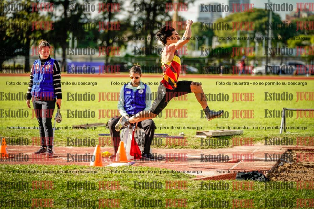 Fotos del salto en largo de varones