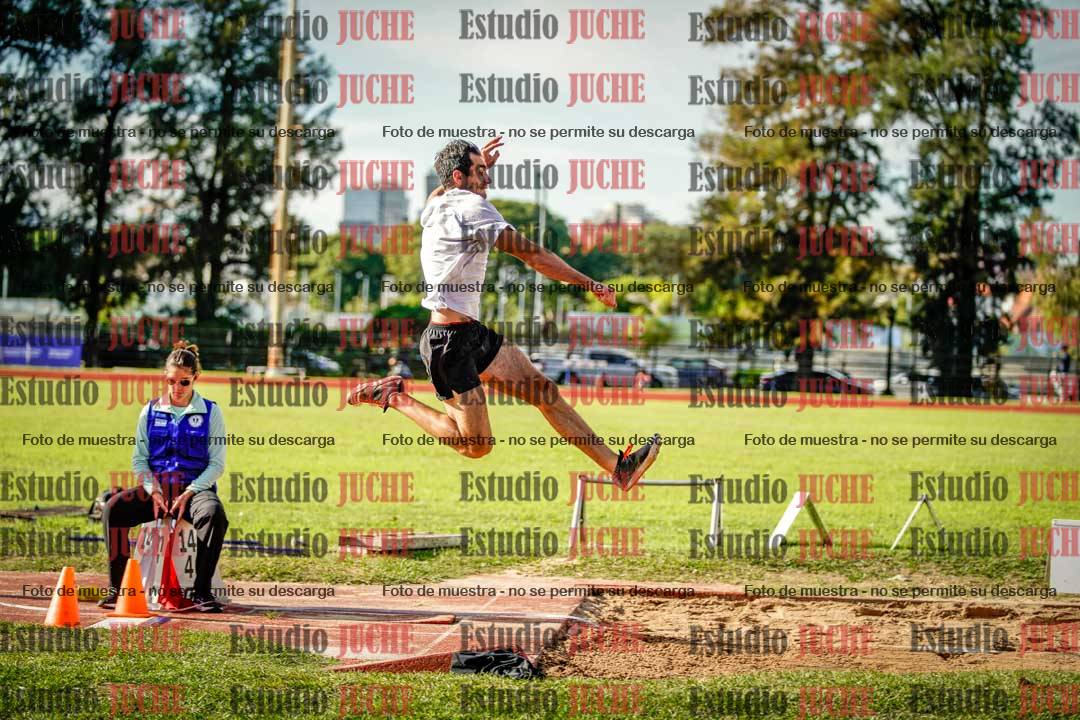 Fotos del salto en largo de varones