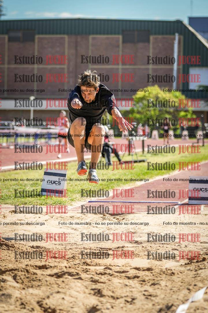 Fotos del salto en largo de varones