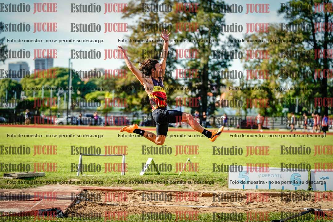 Fotos del salto en largo de varones