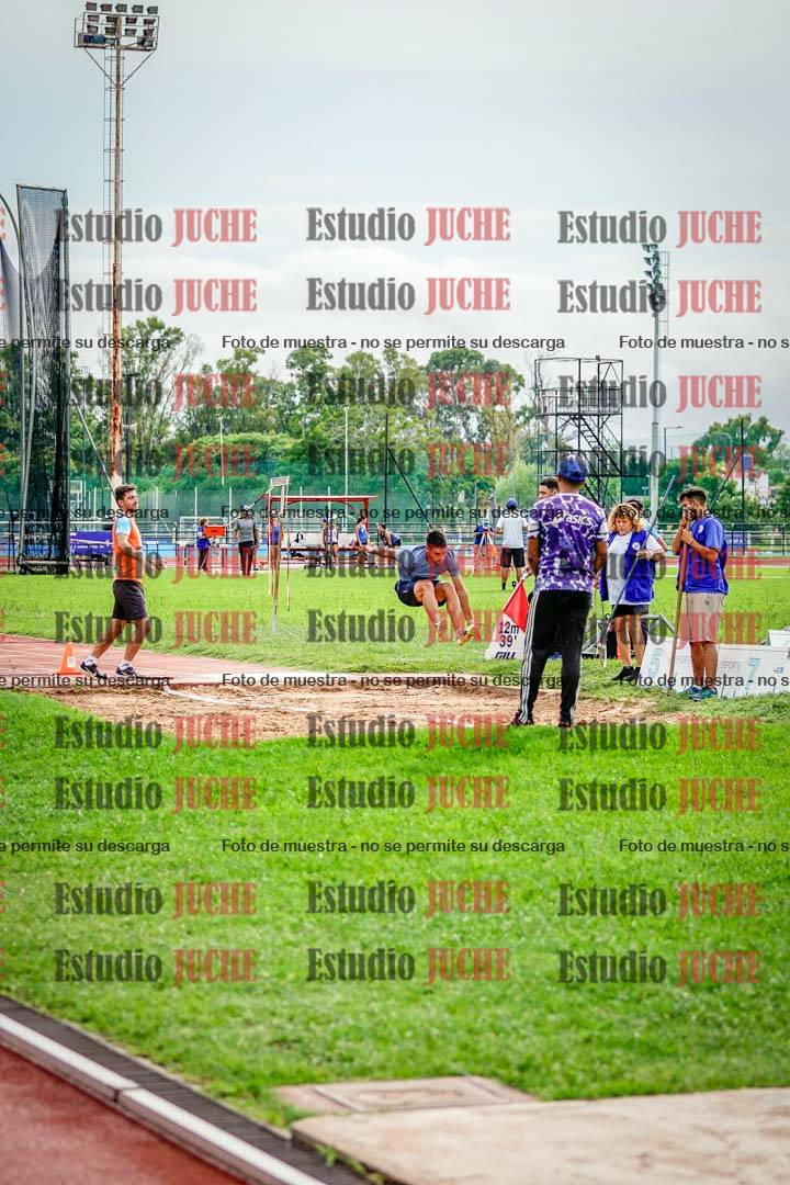 Fotos del salto en largo de varones