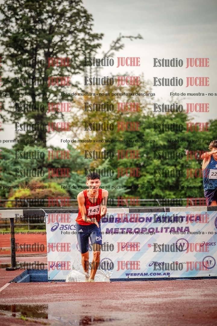 Fotos de los 3000 m con obstáculos de varones