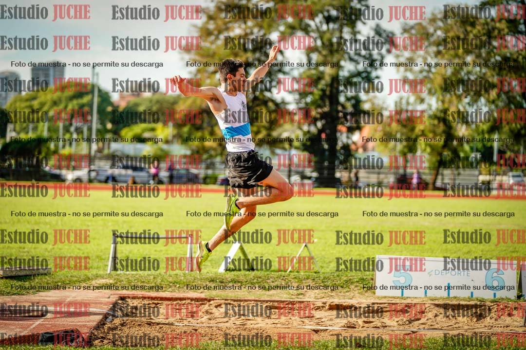 Fotos del salto en largo de varones