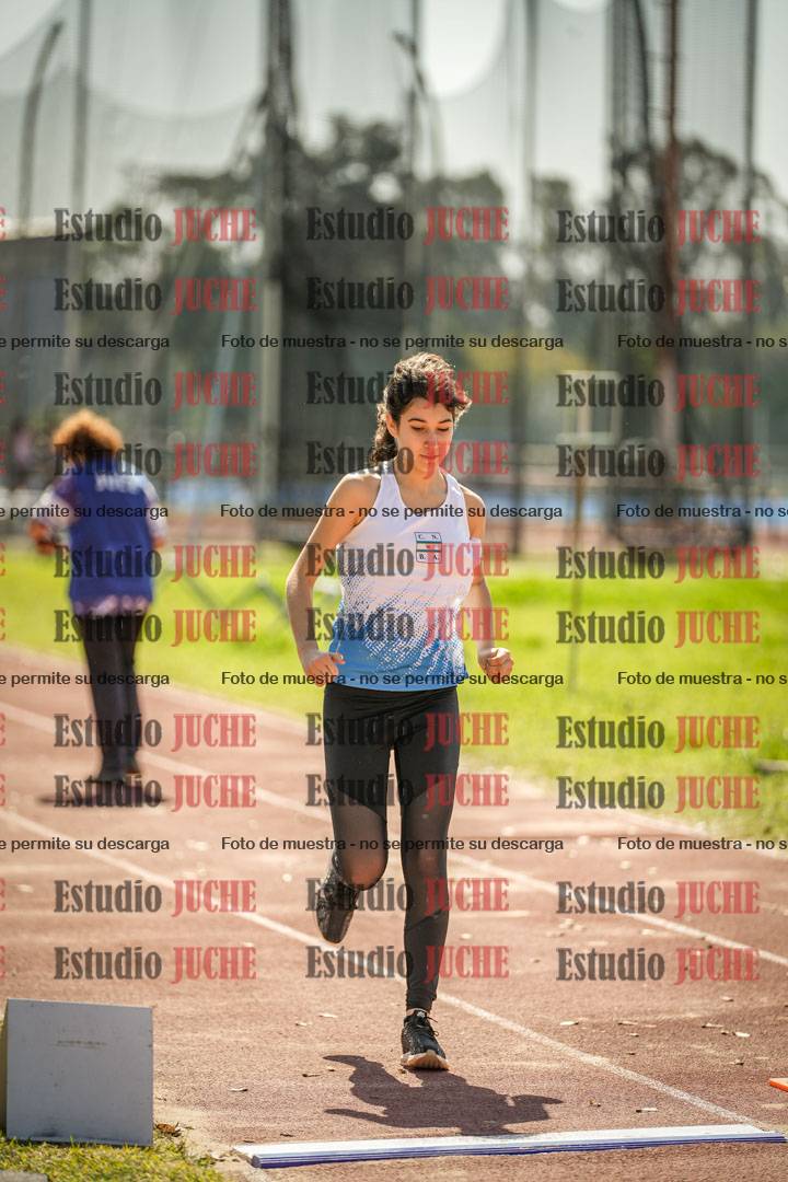 Fotos del salto en largo de mujeres - ambas categorías