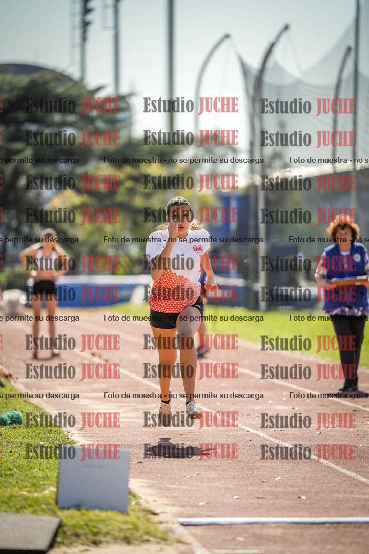Fotos del salto en largo de mujeres - ambas categorías