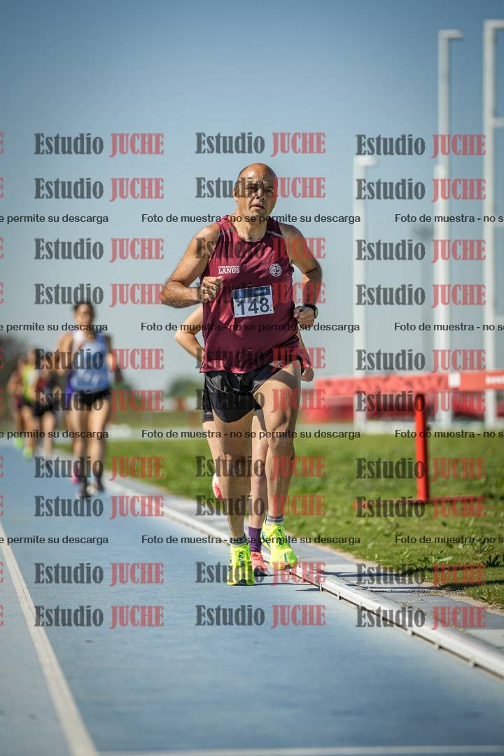 Fotos de los 5000 m de mujeres y varones - serie 2