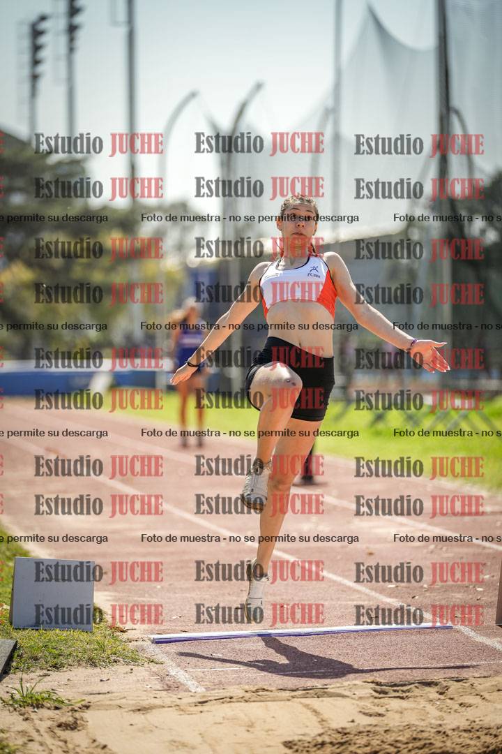 Fotos del salto en largo de mujeres - ambas categorías