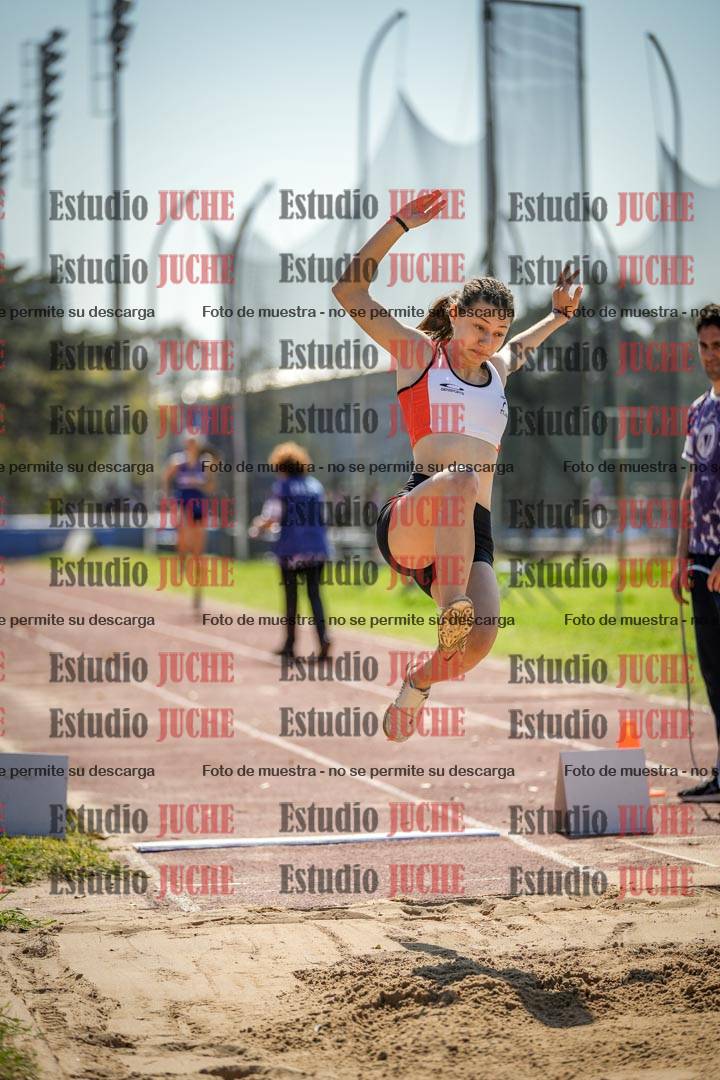 Fotos del salto en largo de mujeres - ambas categorías