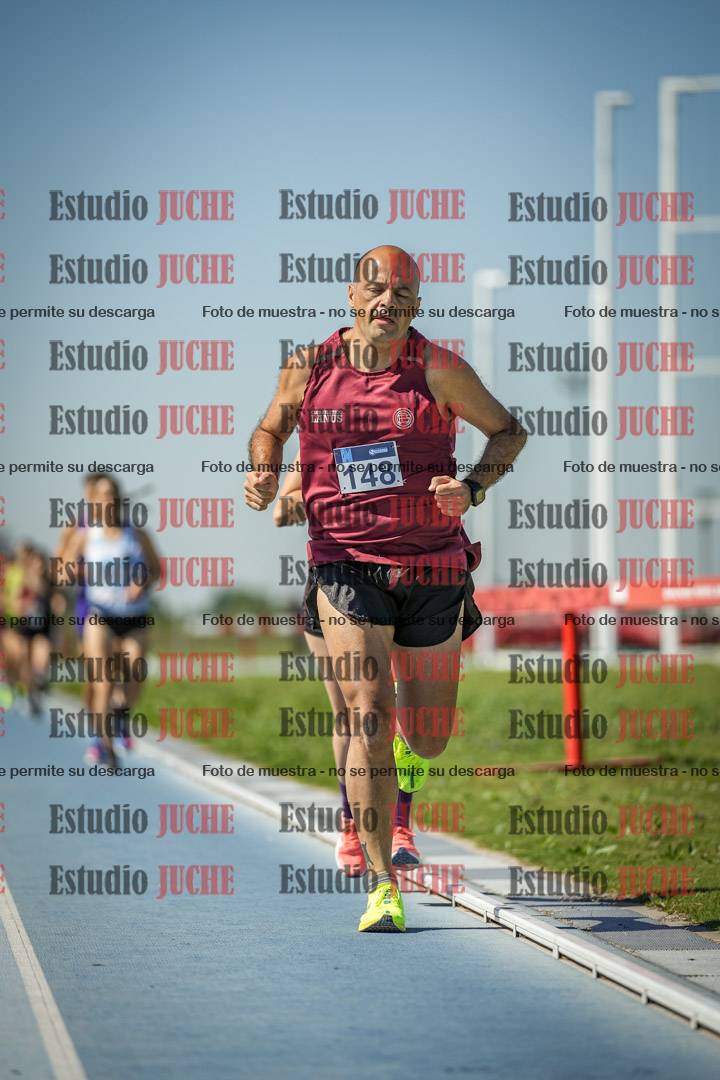 Fotos de los 5000 m de mujeres y varones - serie 2