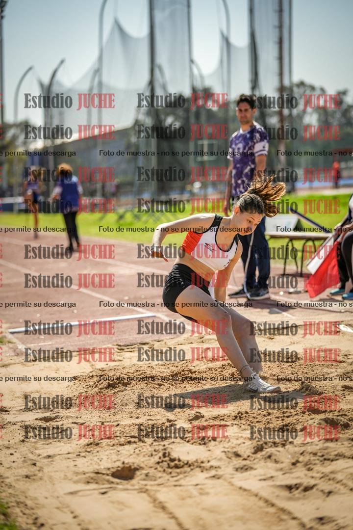 Fotos del salto en largo de mujeres - ambas categorías