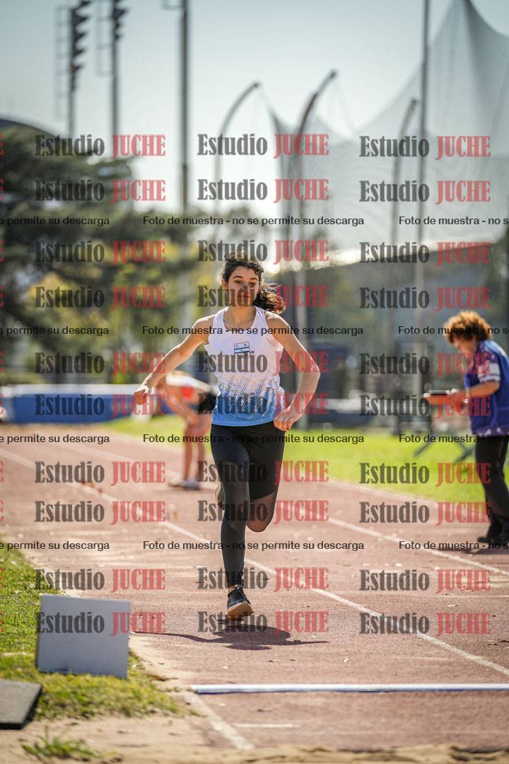 Fotos del salto en largo de mujeres - ambas categorías