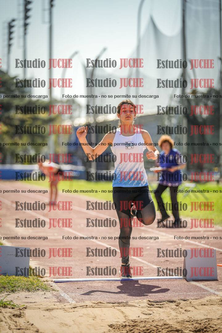 Fotos del salto en largo de mujeres - ambas categorías