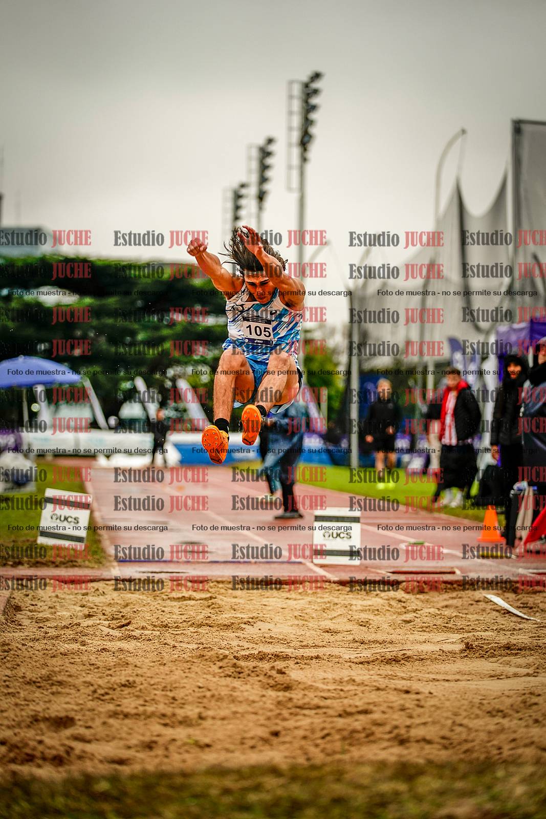 Fotos del salto en largo de varones